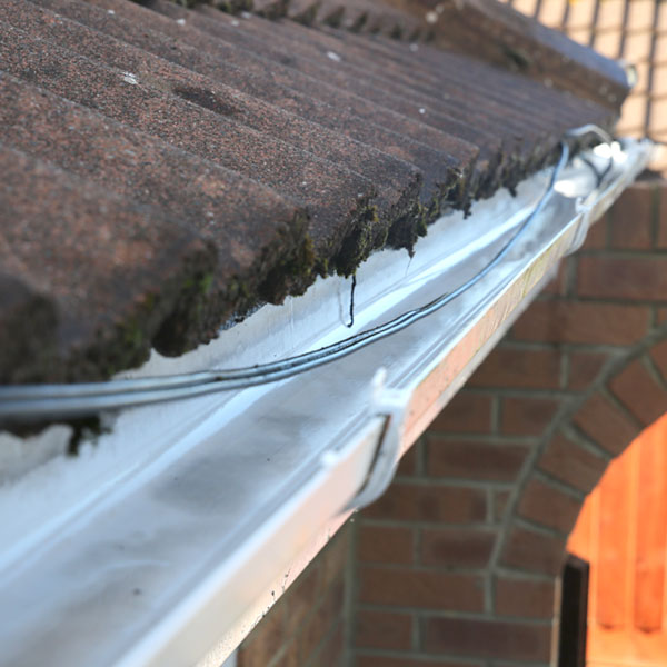 Clean gutter after Gutter-Vac and spray cleaning.