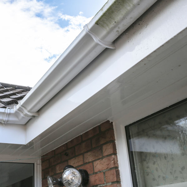 Comparison of spray cleaned and non spray cleaned areas of gutter and fascias.