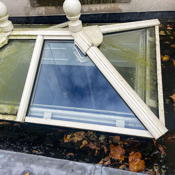 Cleaning roof lantern glass and uPVC frame.